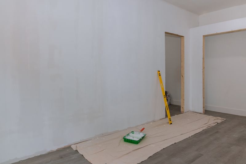 Applying primer on drywall